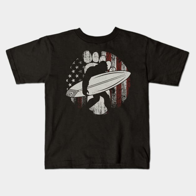 Surfing Bigfoot American Flag Retro Vintage Kids T-Shirt by Tesszero